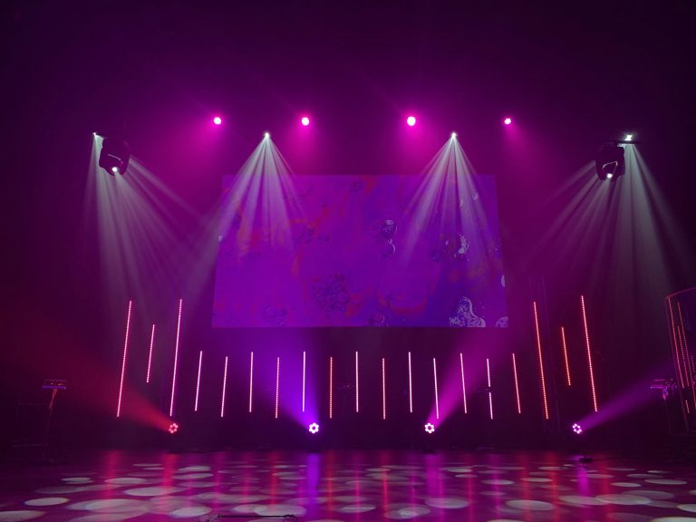 An empty stage before doors